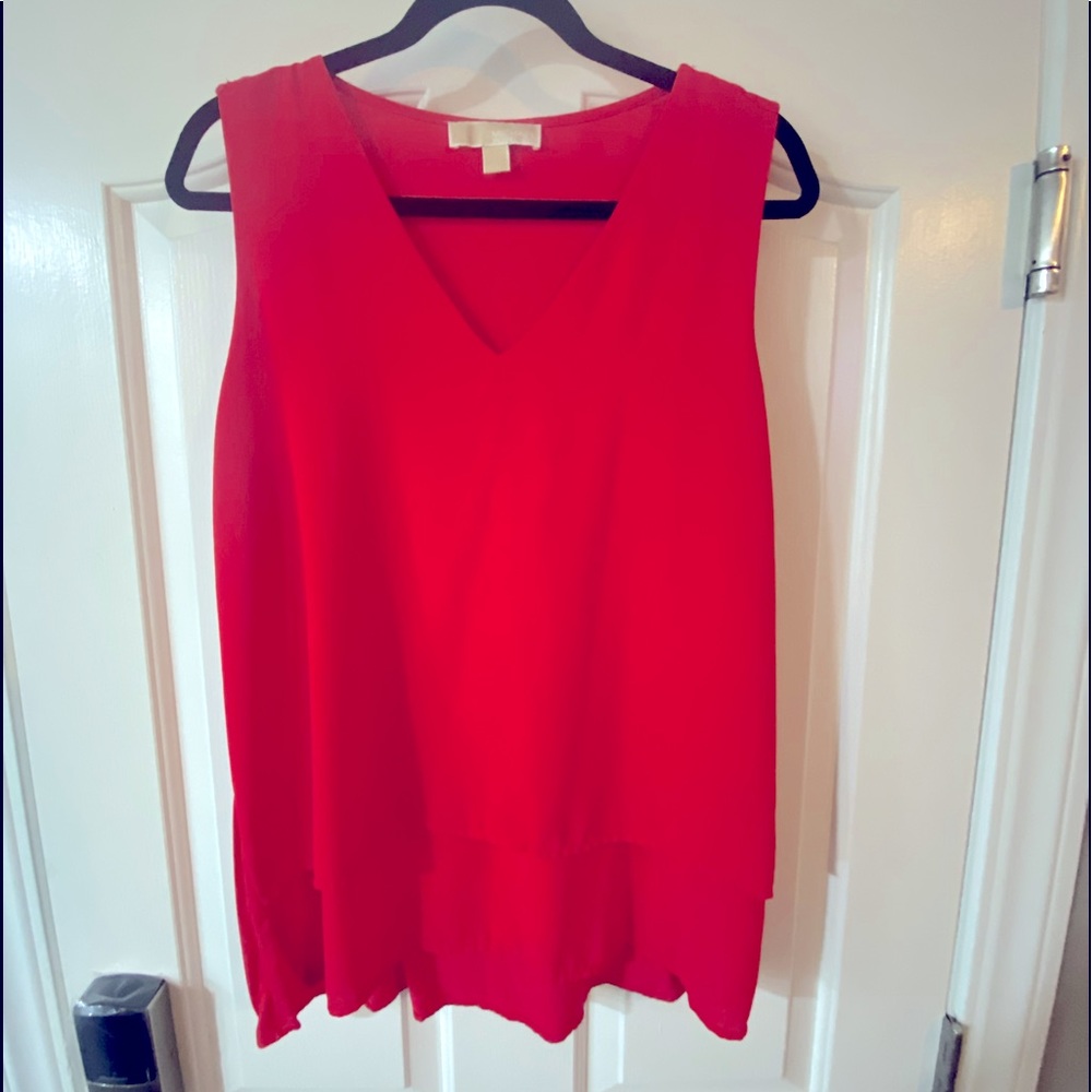Super cute & cool breezy no sleeve blouse.